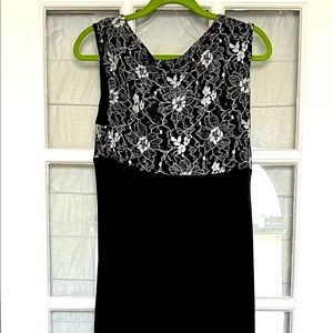 Sleeveless Long, black Connected Apparel evening gown.